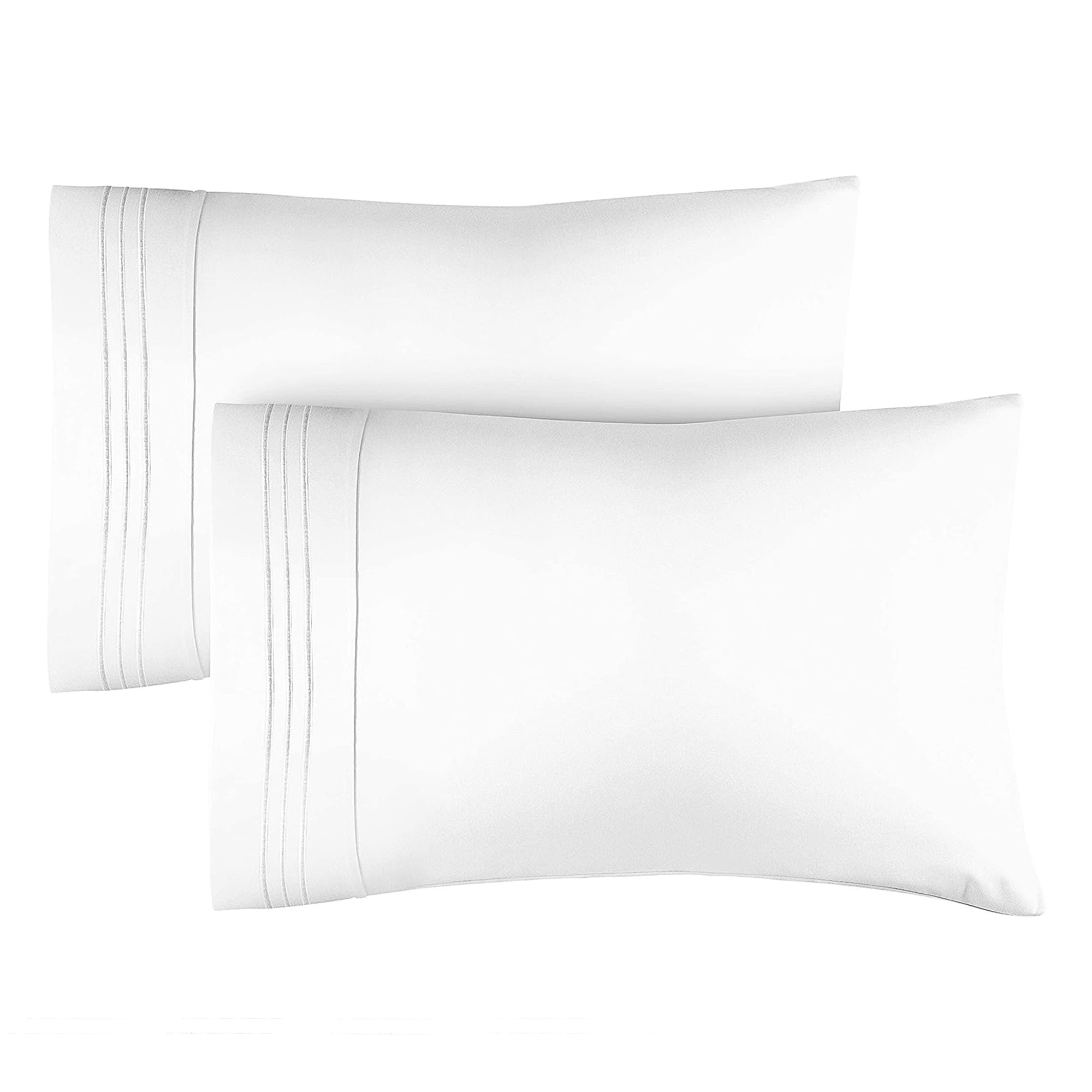 Two white pillowcases with embroidery.